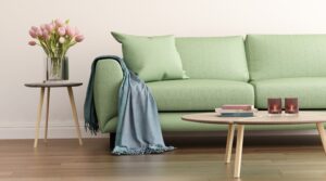 Living Room With Sofa And Flowers